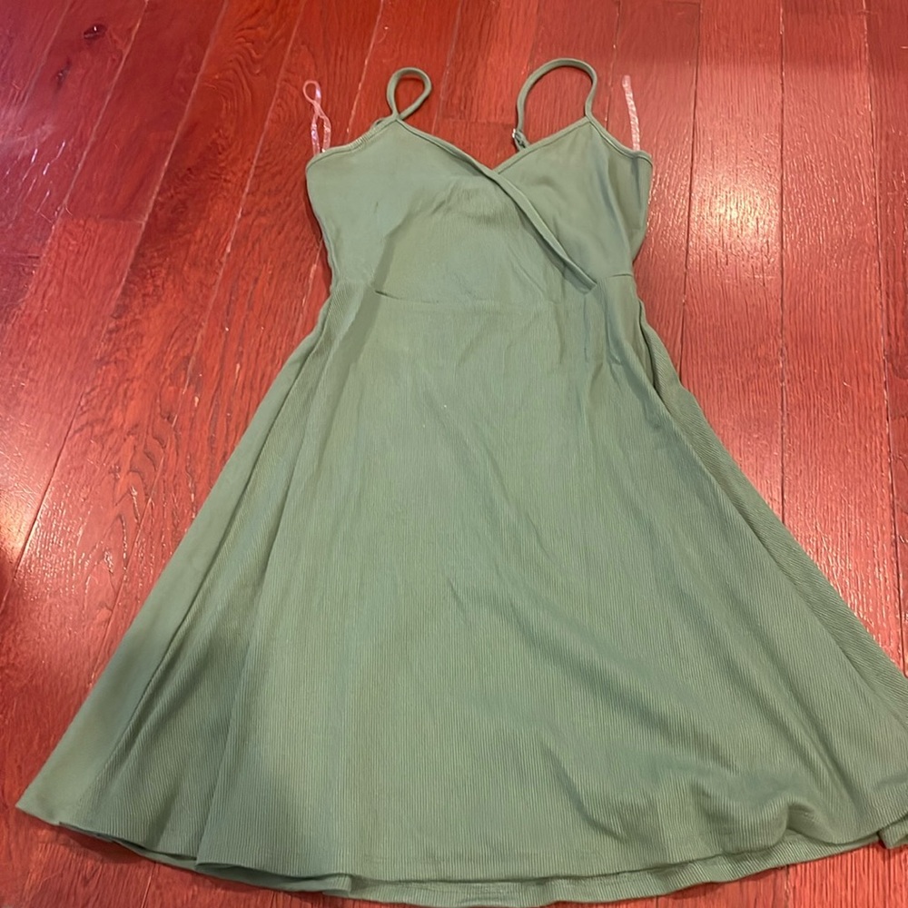 green spaghetti strap flowy dress